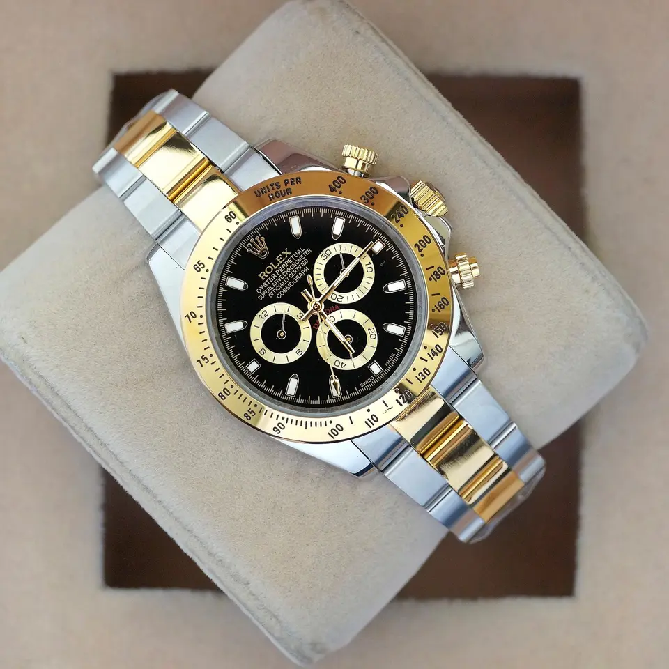 Rolex Daytona — black dial, two-tone