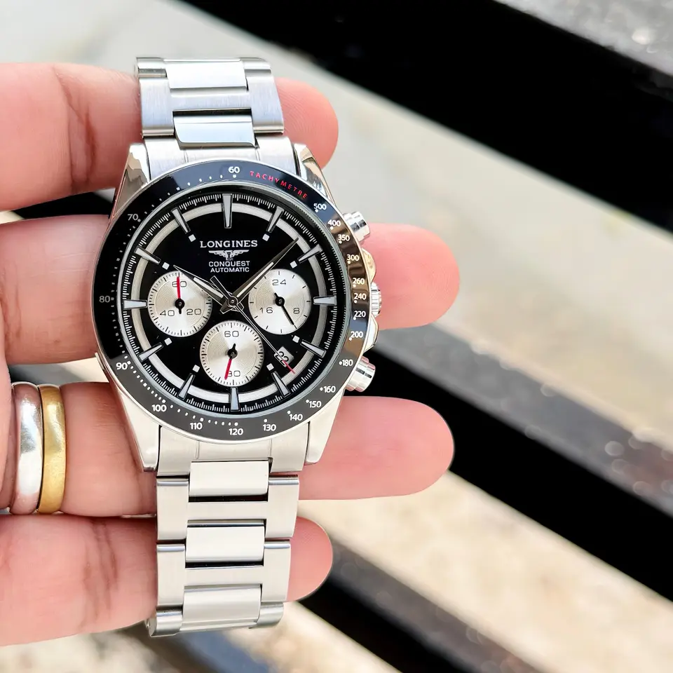 Longines Conquest — black dial