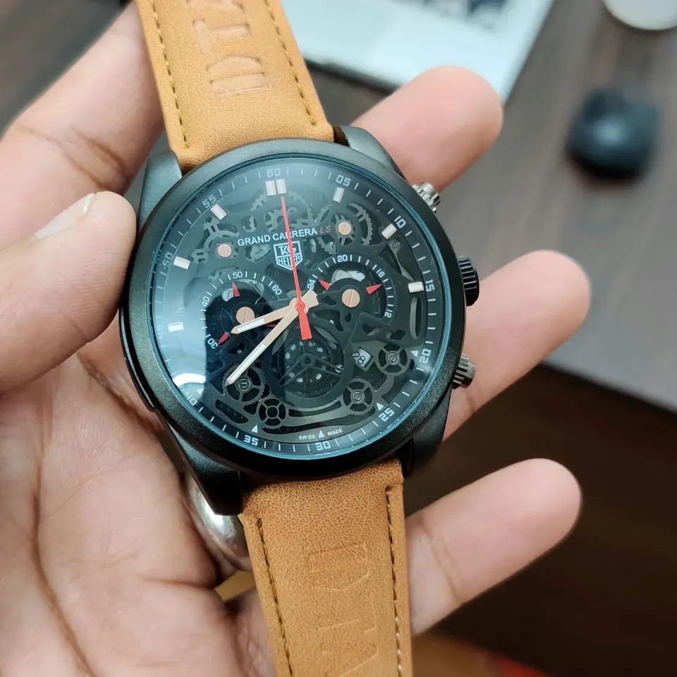 TAG Heuer Grand Carrera — open-worked dial, black case