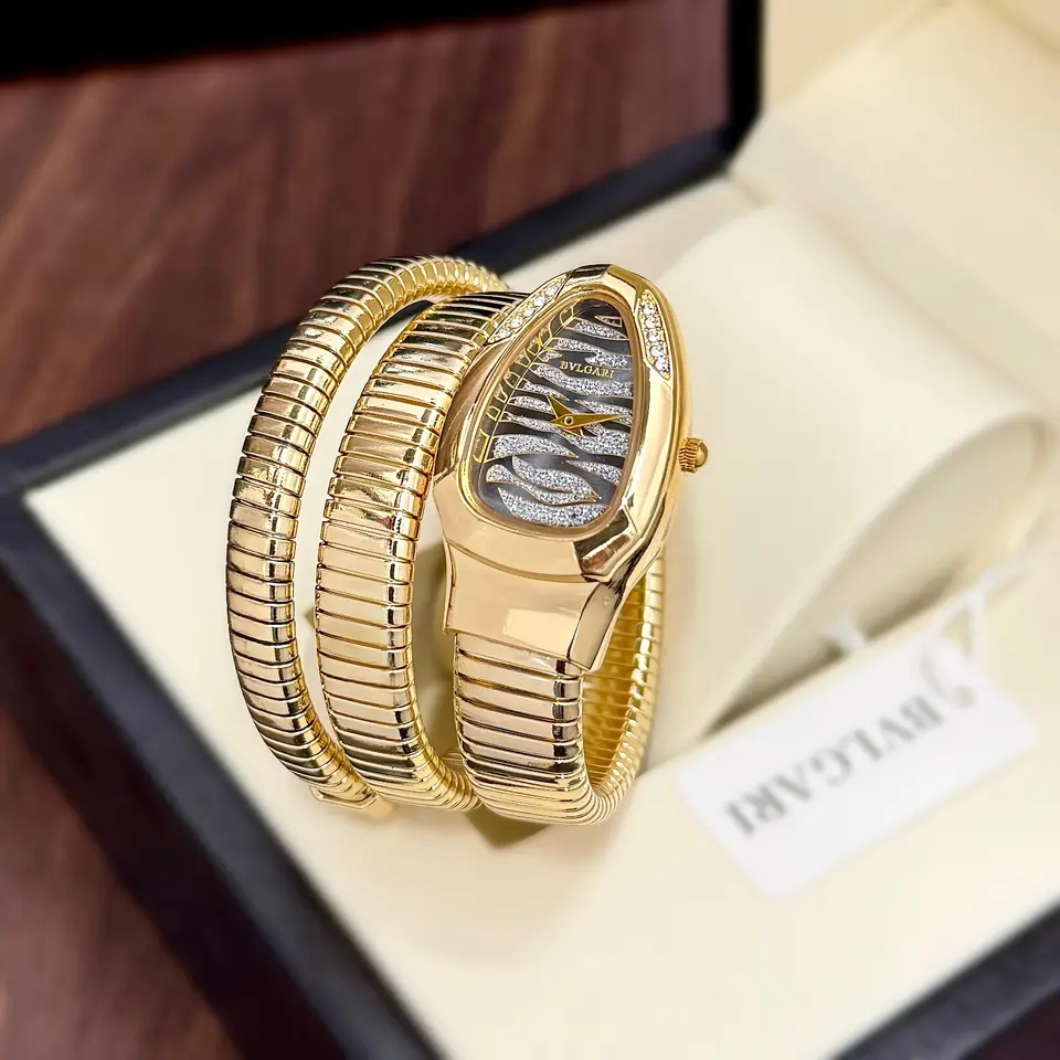 Bvlgari Serpenti — silver dial, gold