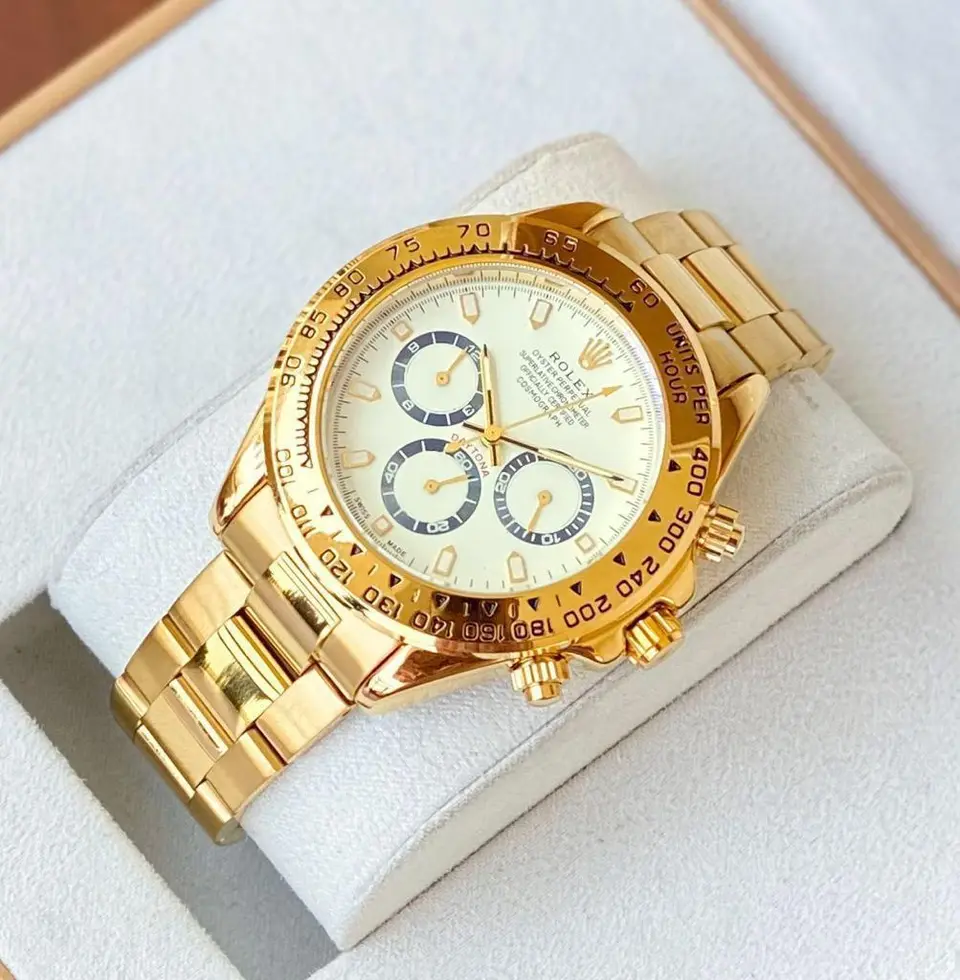 Rolex Daytona — white dial, gold