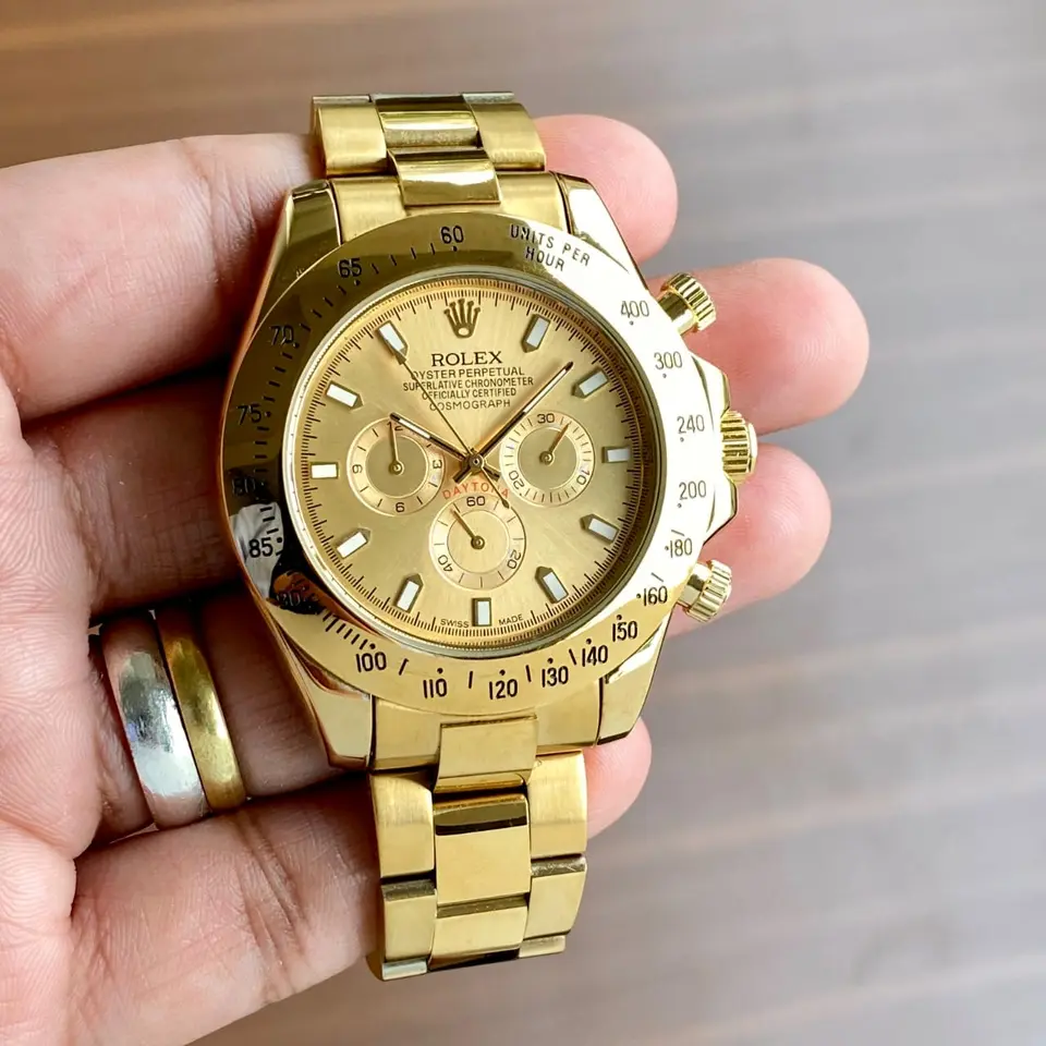 Rolex Daytona — gold dial, gold