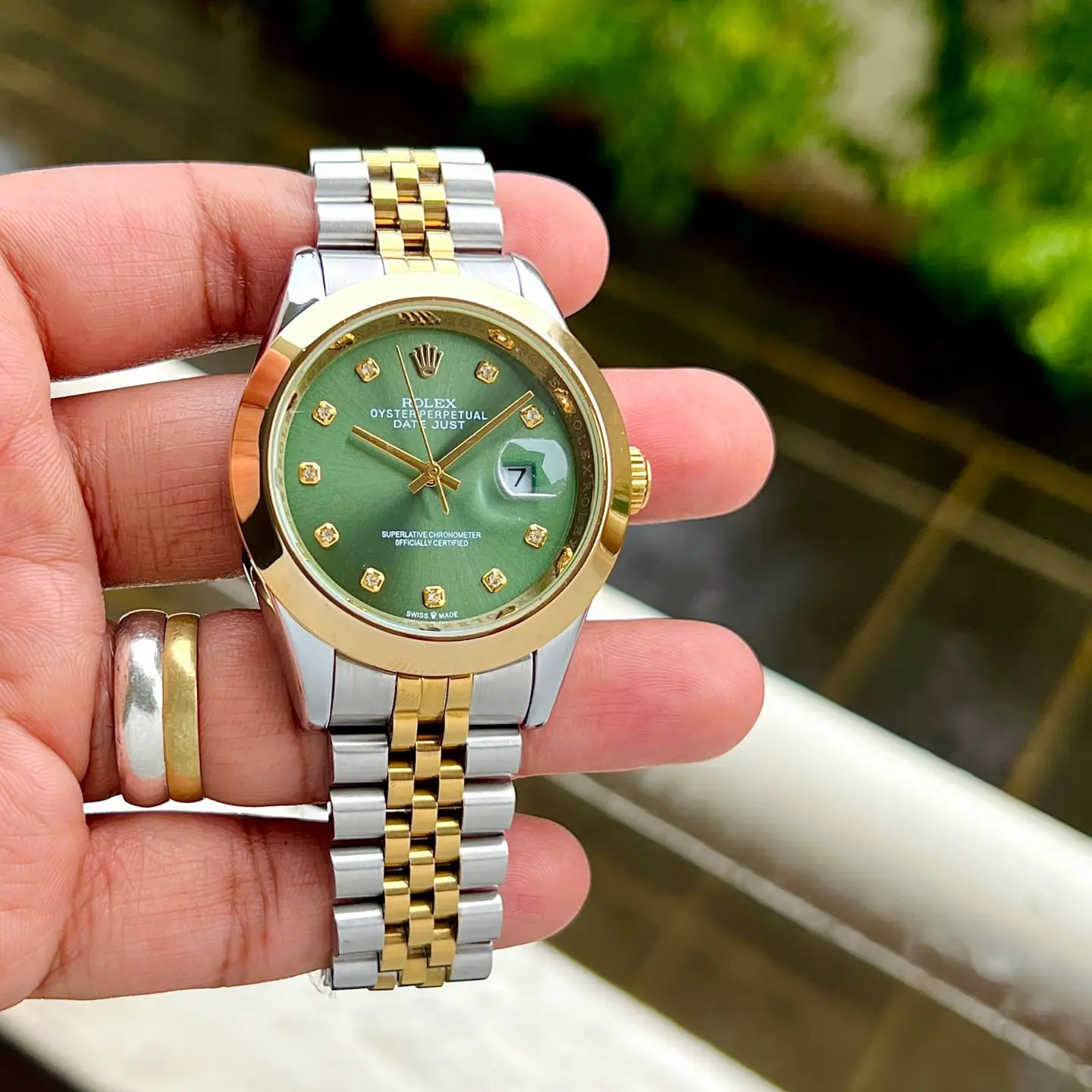 Rolex Datejust — green dial, two-tone