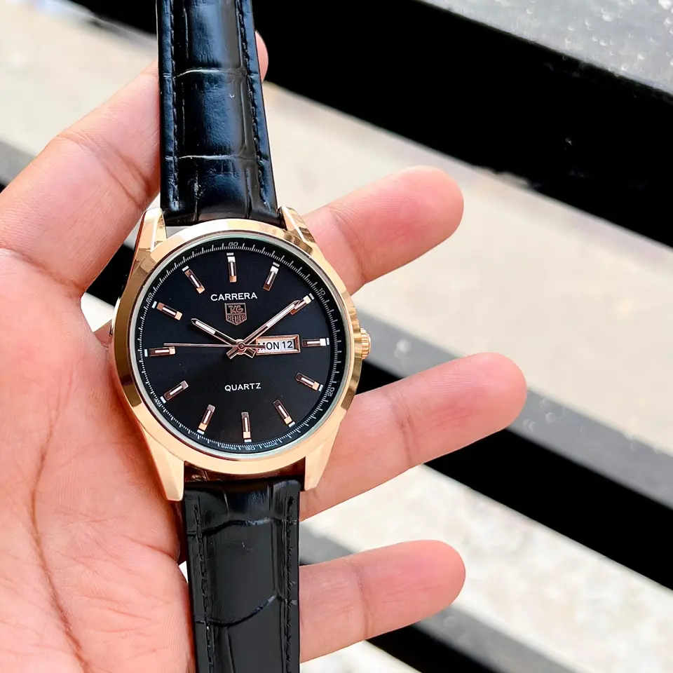 TAG Heuer Carrera — black dial, rose gold