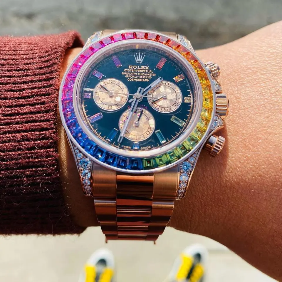 Rolex Daytona — black dial, rose gold