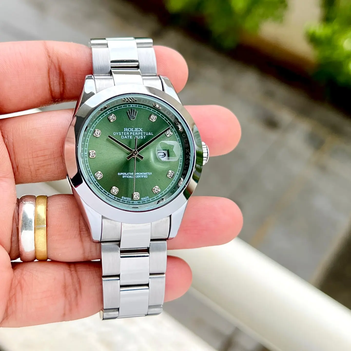 Rolex Datejust — green dial