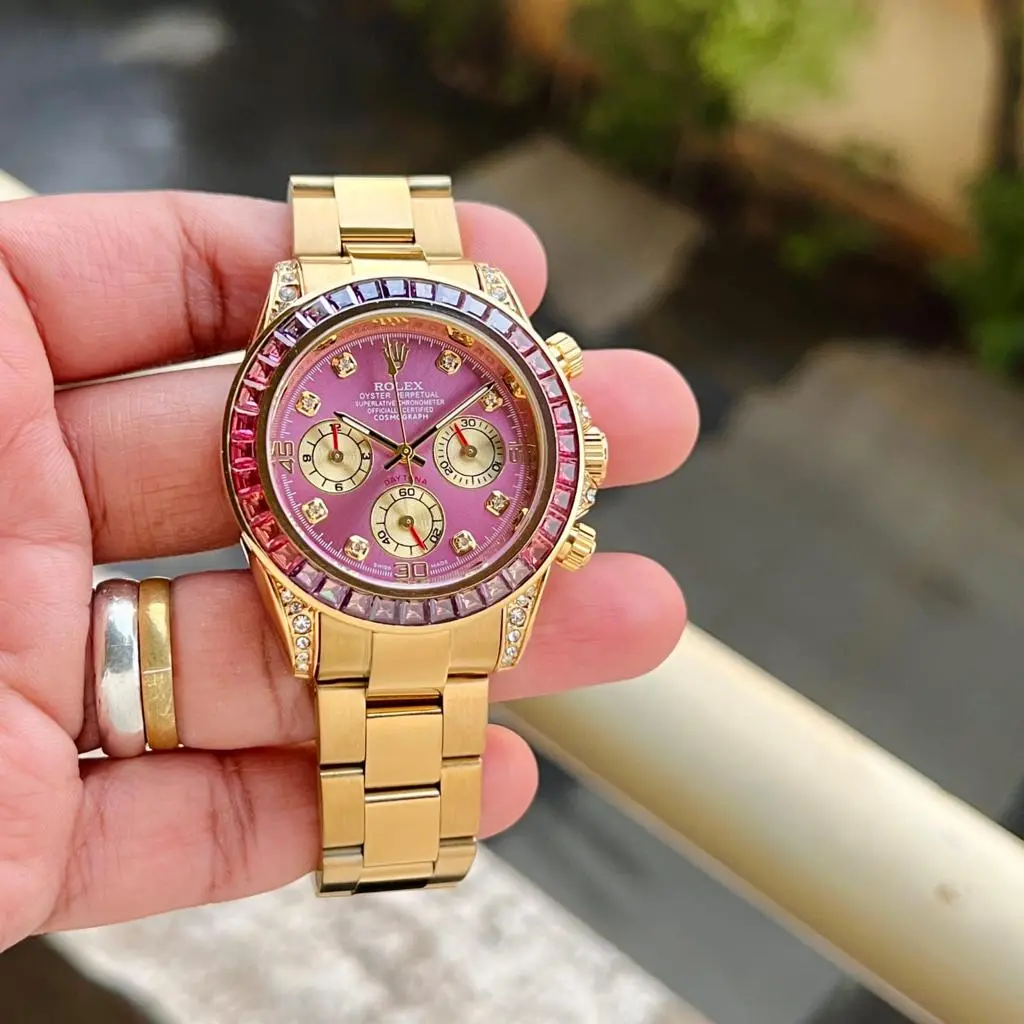 Rolex Daytona — pink dial, gold