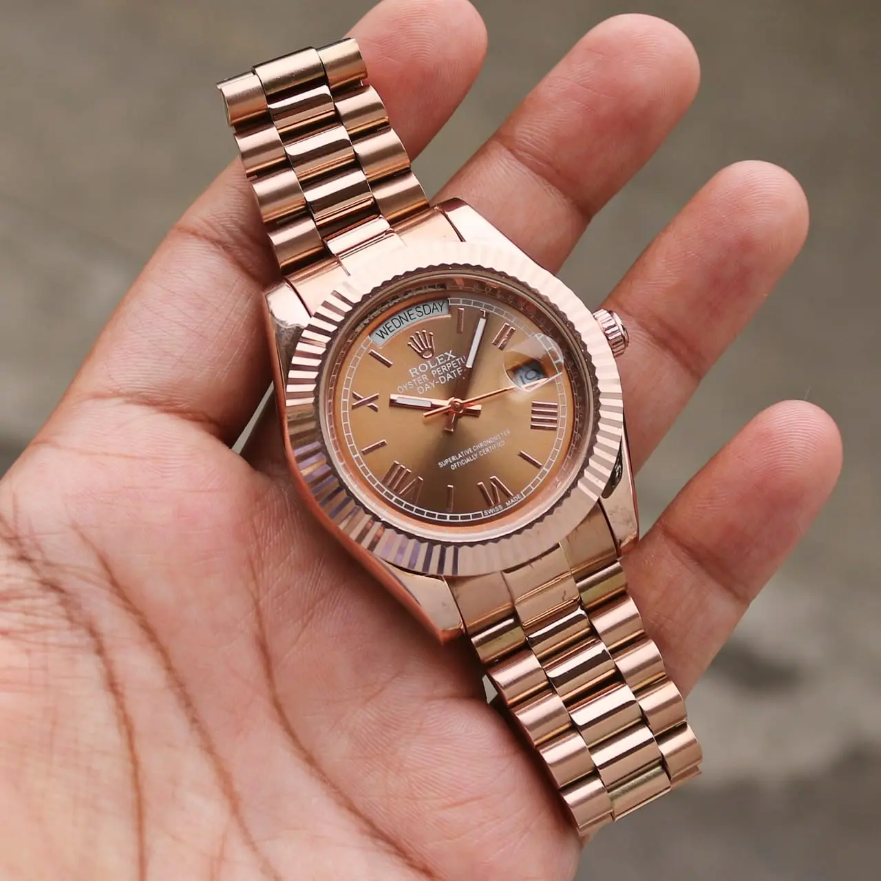 Rolex Day-Date — rose dial, rose gold