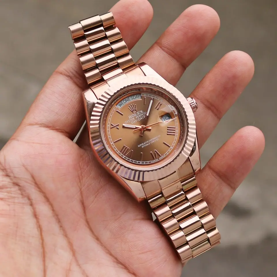 Rolex Day-Date — rose dial, rose gold