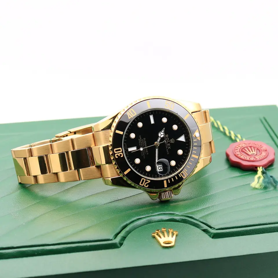 Rolex Submariner — black dial, gold