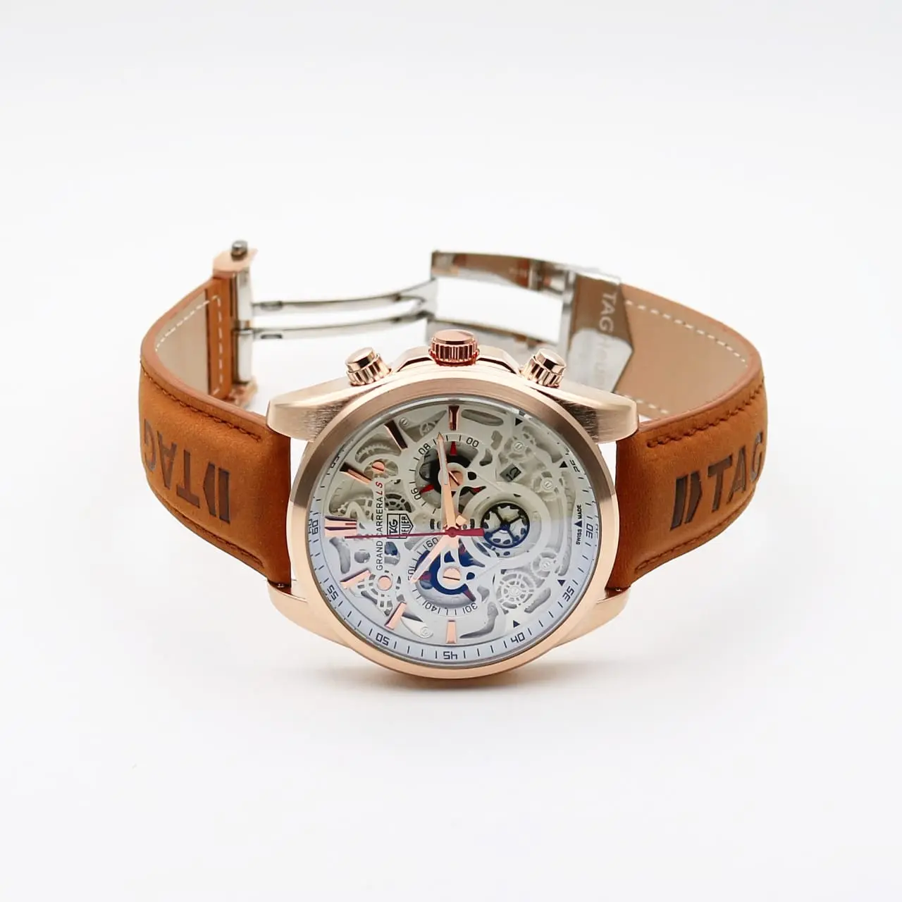 TAG Heuer Skeleton — open-worked dial, rose gold