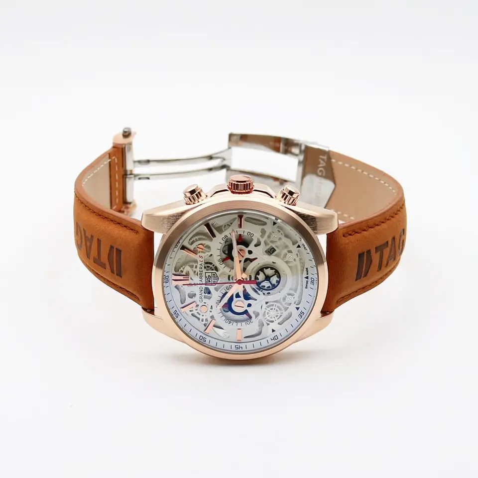 TAG Heuer Skeleton — open-worked dial, rose gold