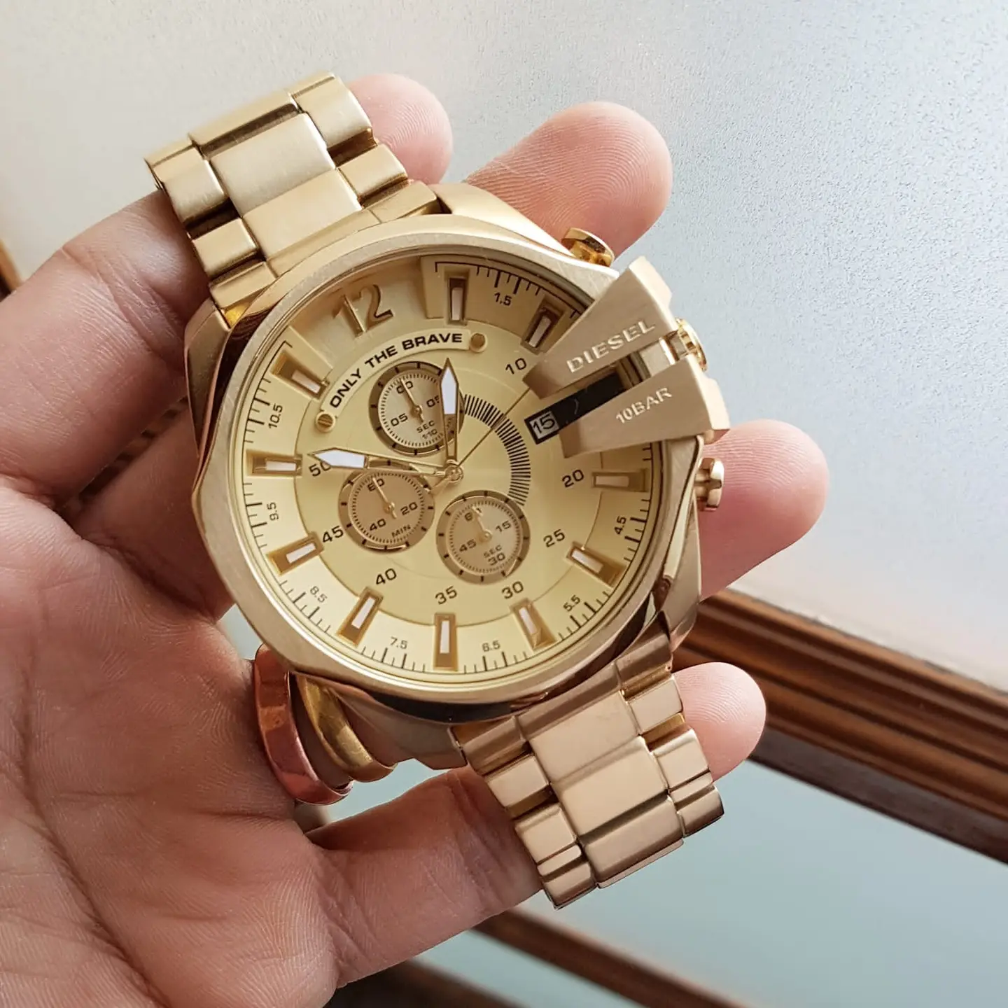 Diesel Mega Chief — gold dial, gold