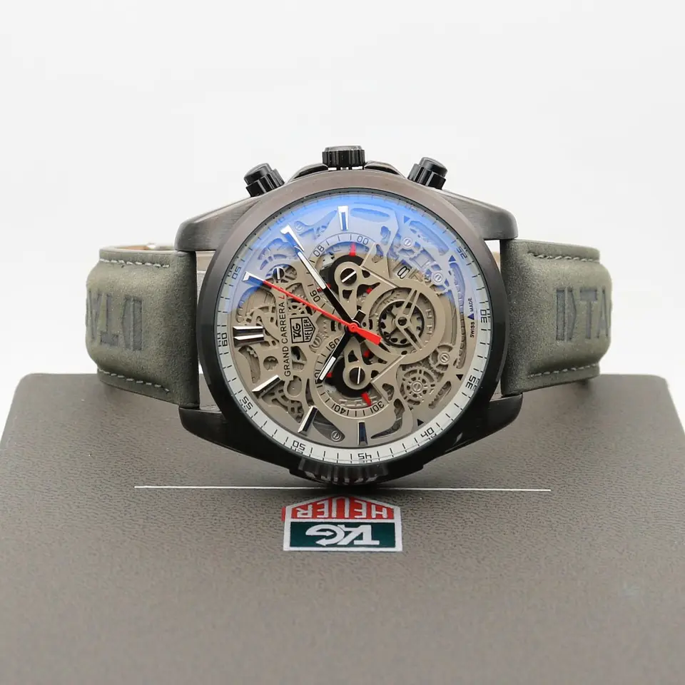 TAG Heuer Grand Carrera — open-worked dial, black case