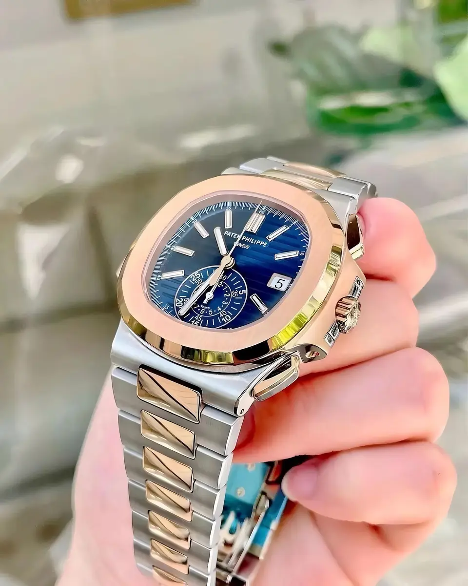 Patek Philippe Nautilus — blue dial, two-tone