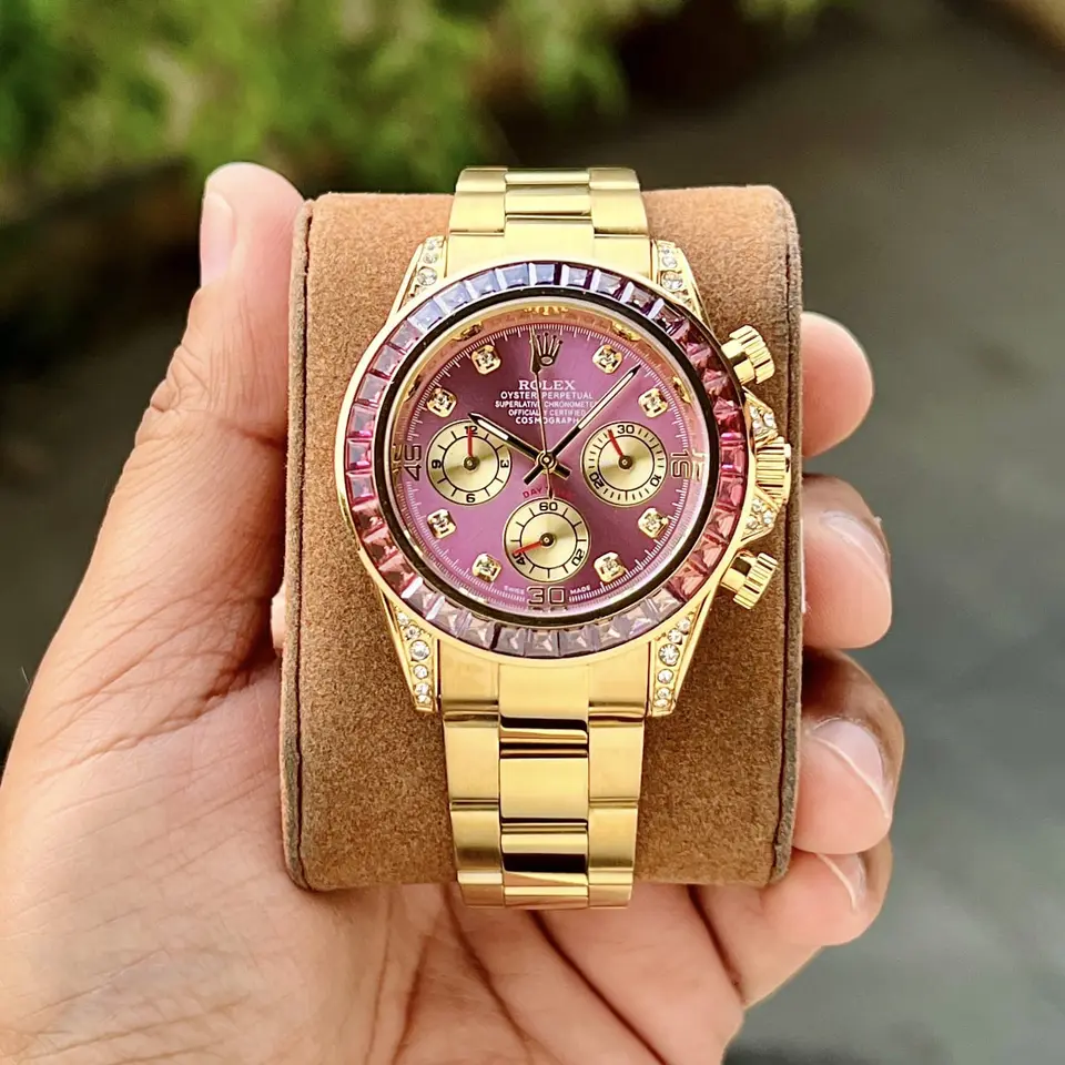 Rolex Daytona — black dial, gold
