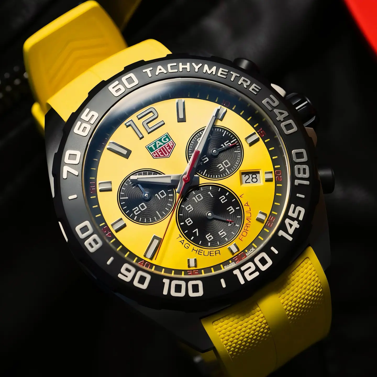 TAG Heuer Formula 1 — gold dial, black case