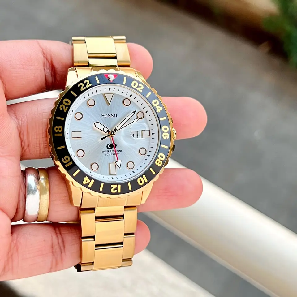 Fossil Blue GMT — blue dial, gold