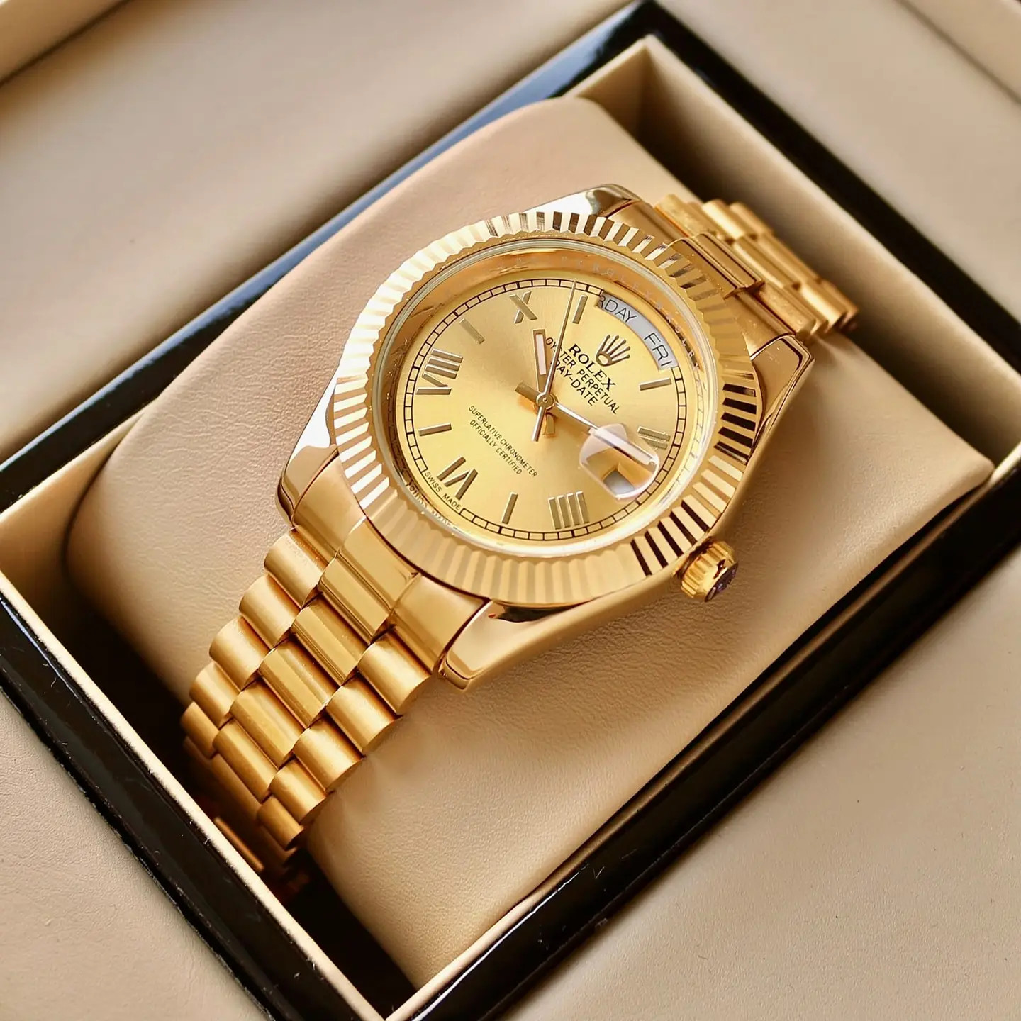 Rolex Day-Date — gold dial, gold