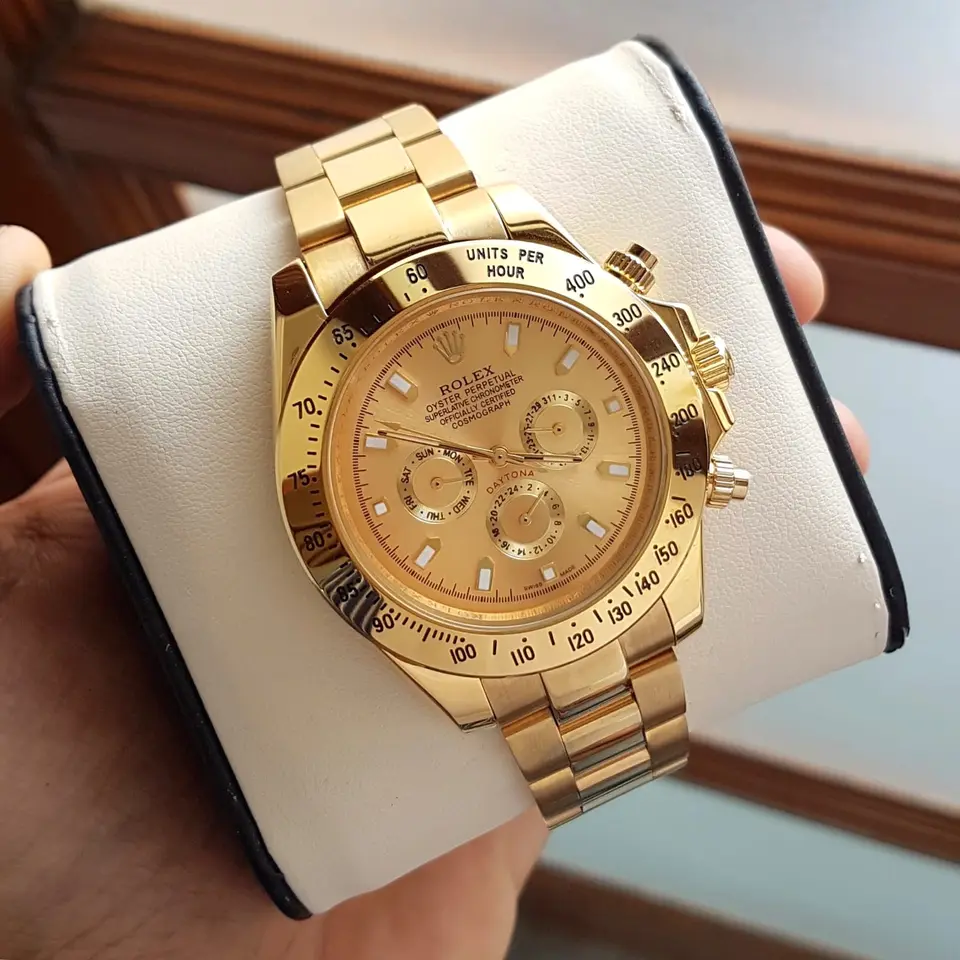 Rolex Daytona — gold dial, gold