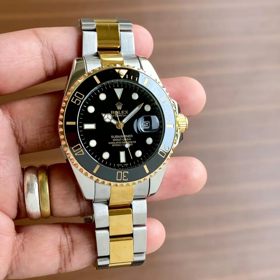 Rolex Submariner — black dial, two-tone