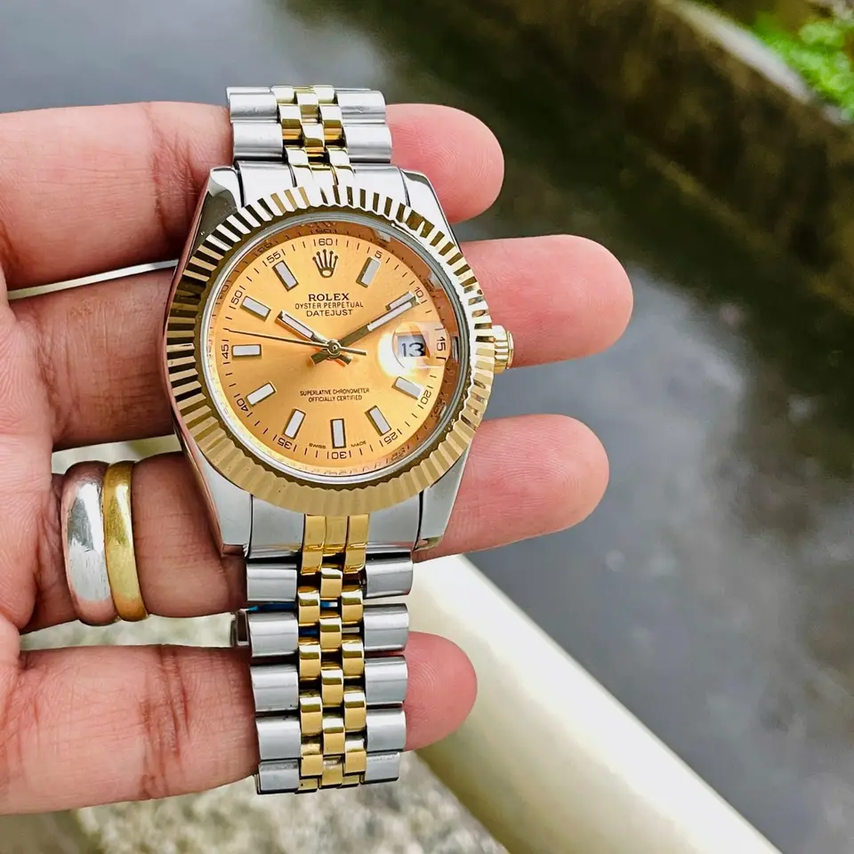 Rolex Datejust — gold dial, two-tone