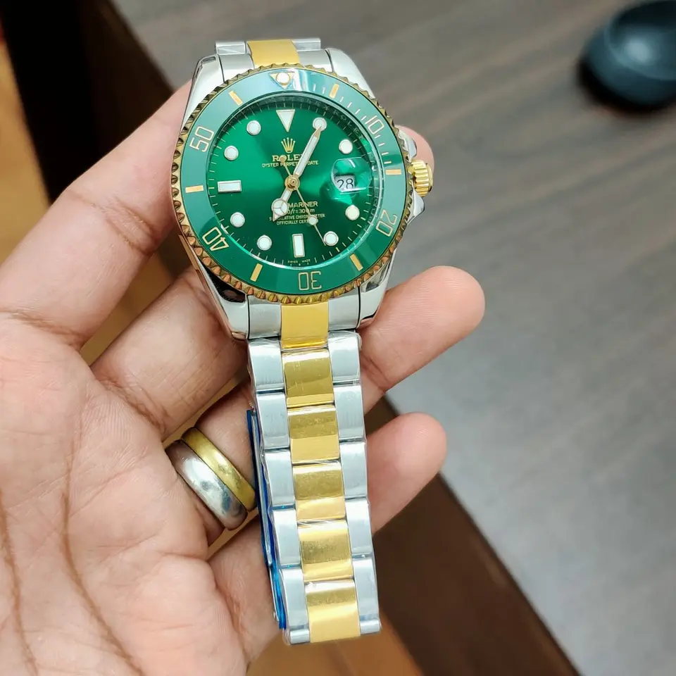 Rolex Submariner — green dial, two-tone
