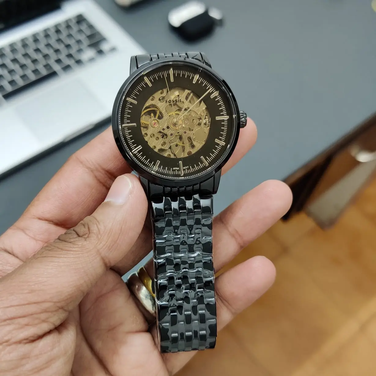 Fossil Skeleton — open-worked dial, black case