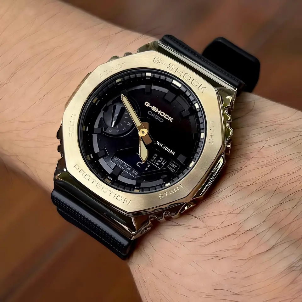 G-Shock GM-2100 — black dial, gold