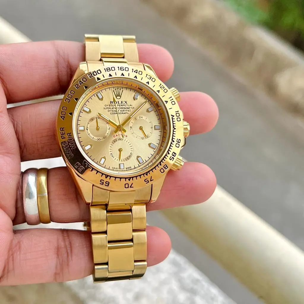 Rolex Daytona — gold dial, gold