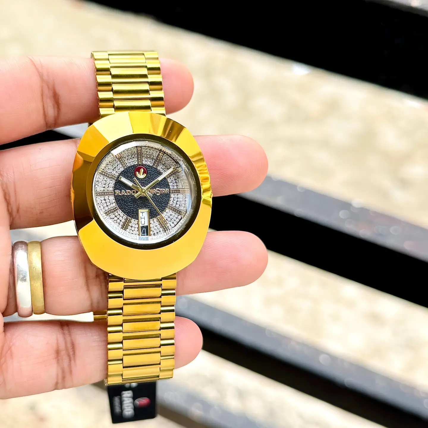 Rado DiaStar — black dial, gold