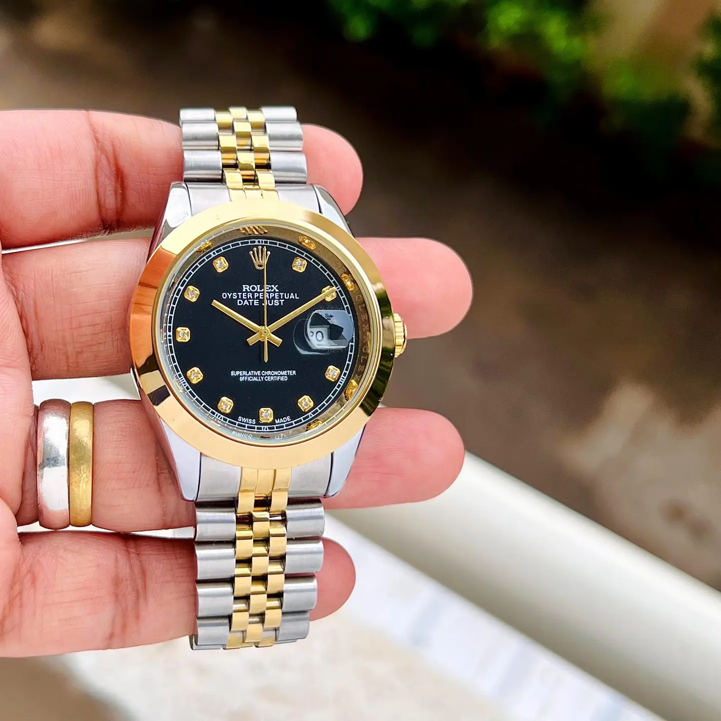 Rolex Datejust — black dial, two-tone