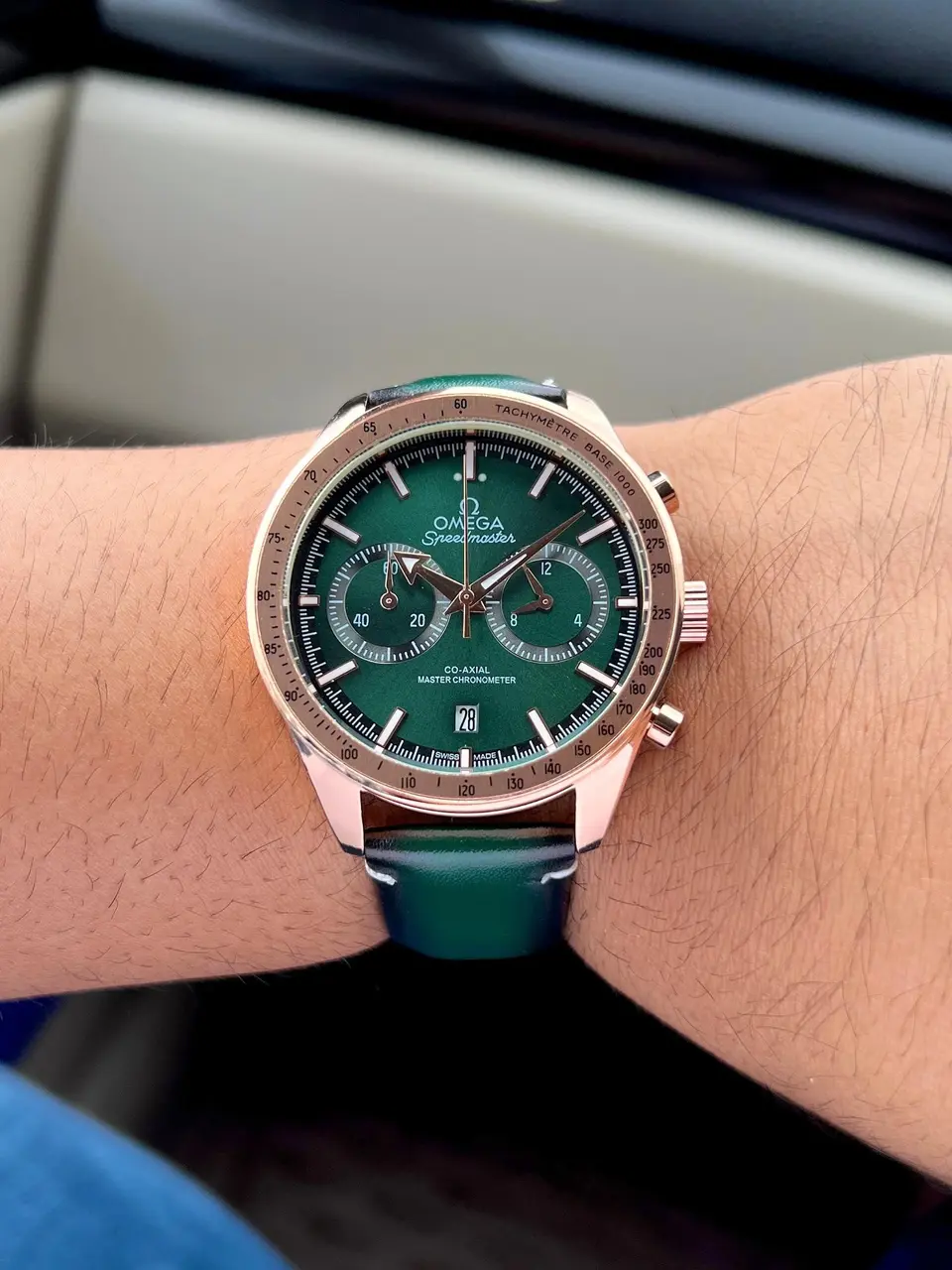 Omega Speedmaster — green dial, rose gold
