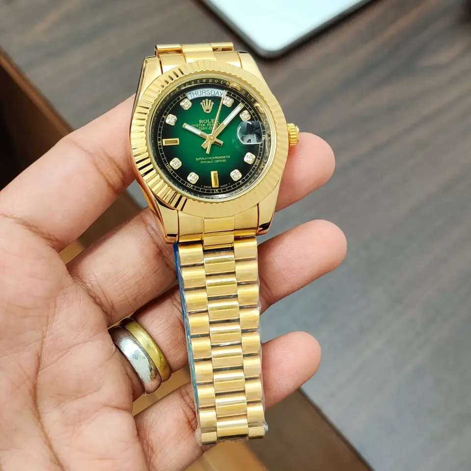Rolex Day-Date — green dial, gold