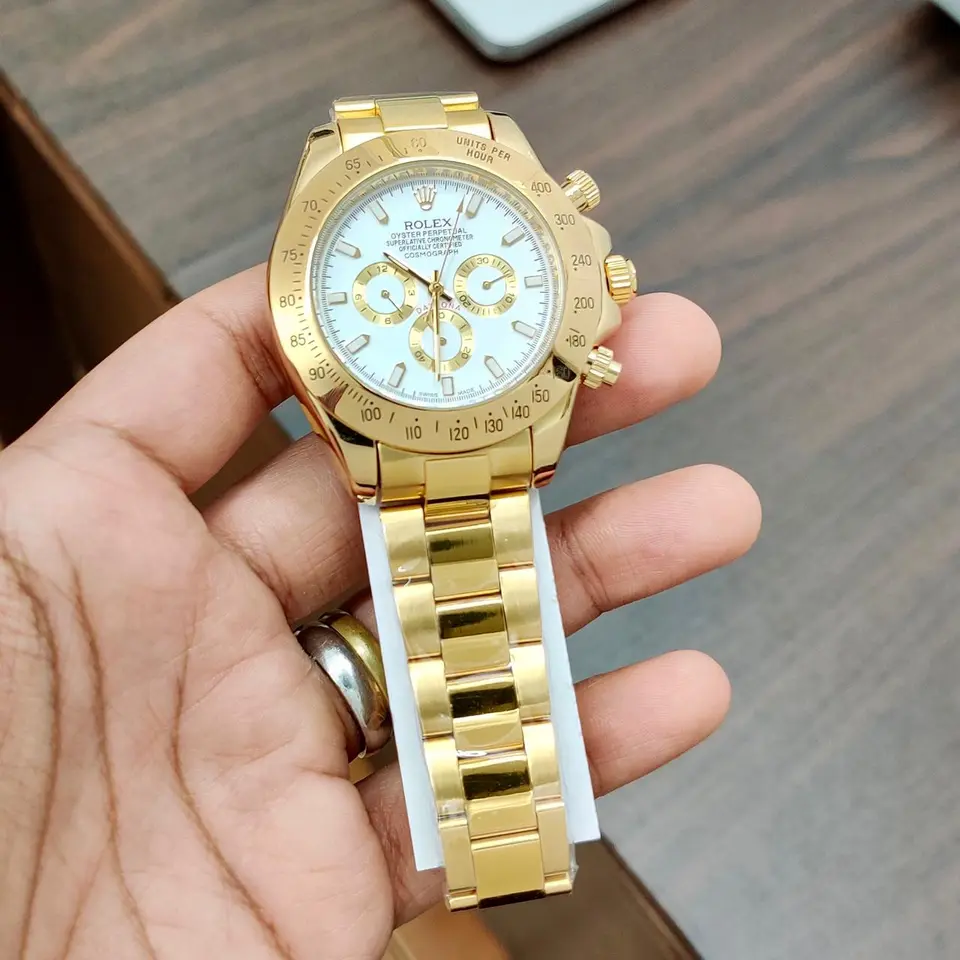 Rolex Daytona — white dial, gold