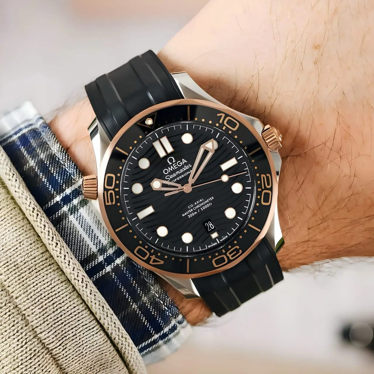Omega Seamaster — black dial, two-tone