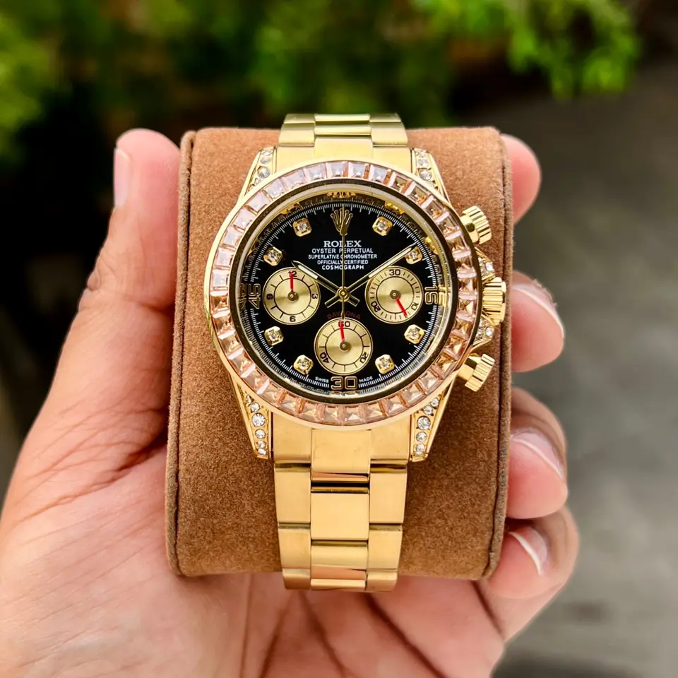 Rolex Daytona — black dial, gold
