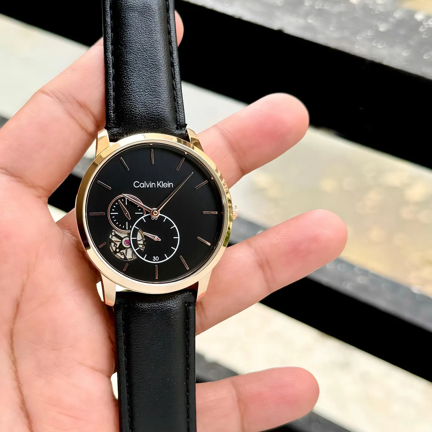 Calvin Klein Automatic — black dial, rose gold