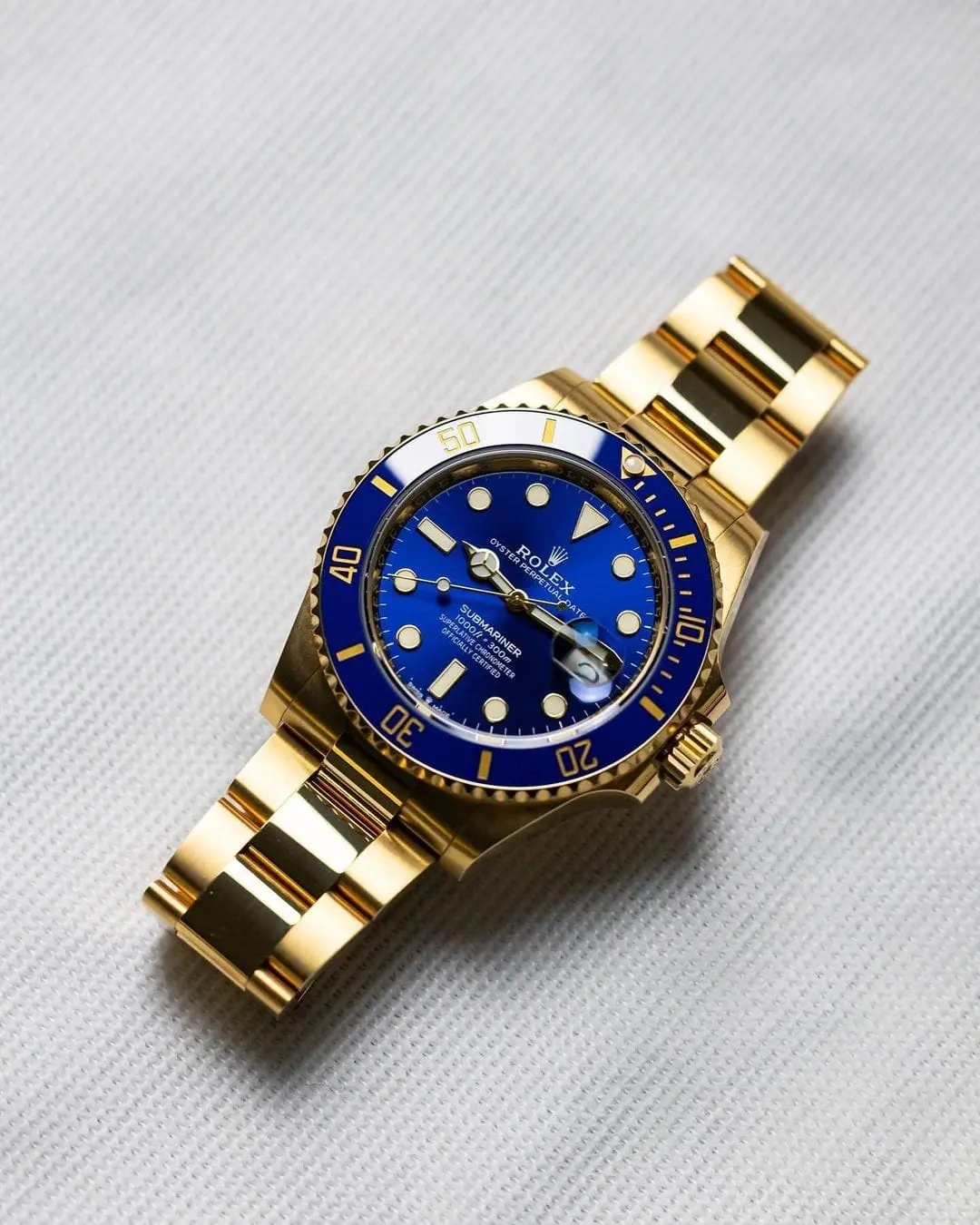 Rolex Submariner — blue dial, gold