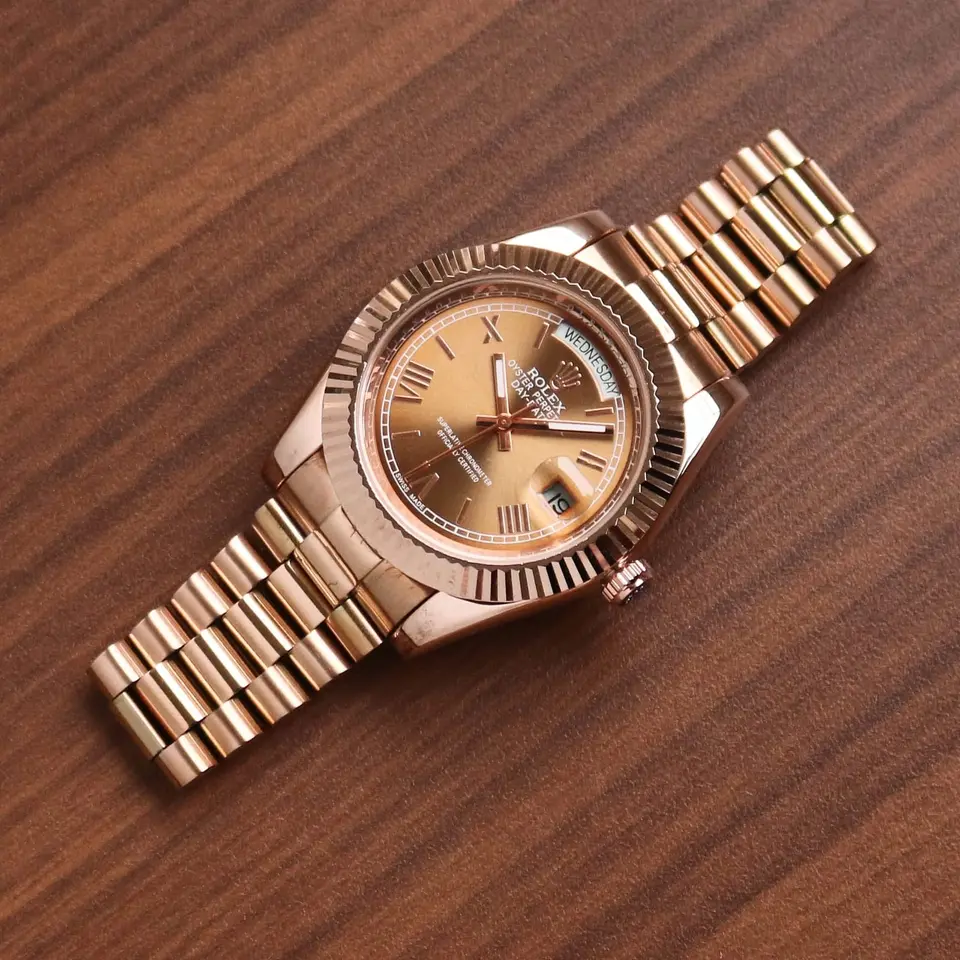 Rolex Day-Date — rose dial, rose gold