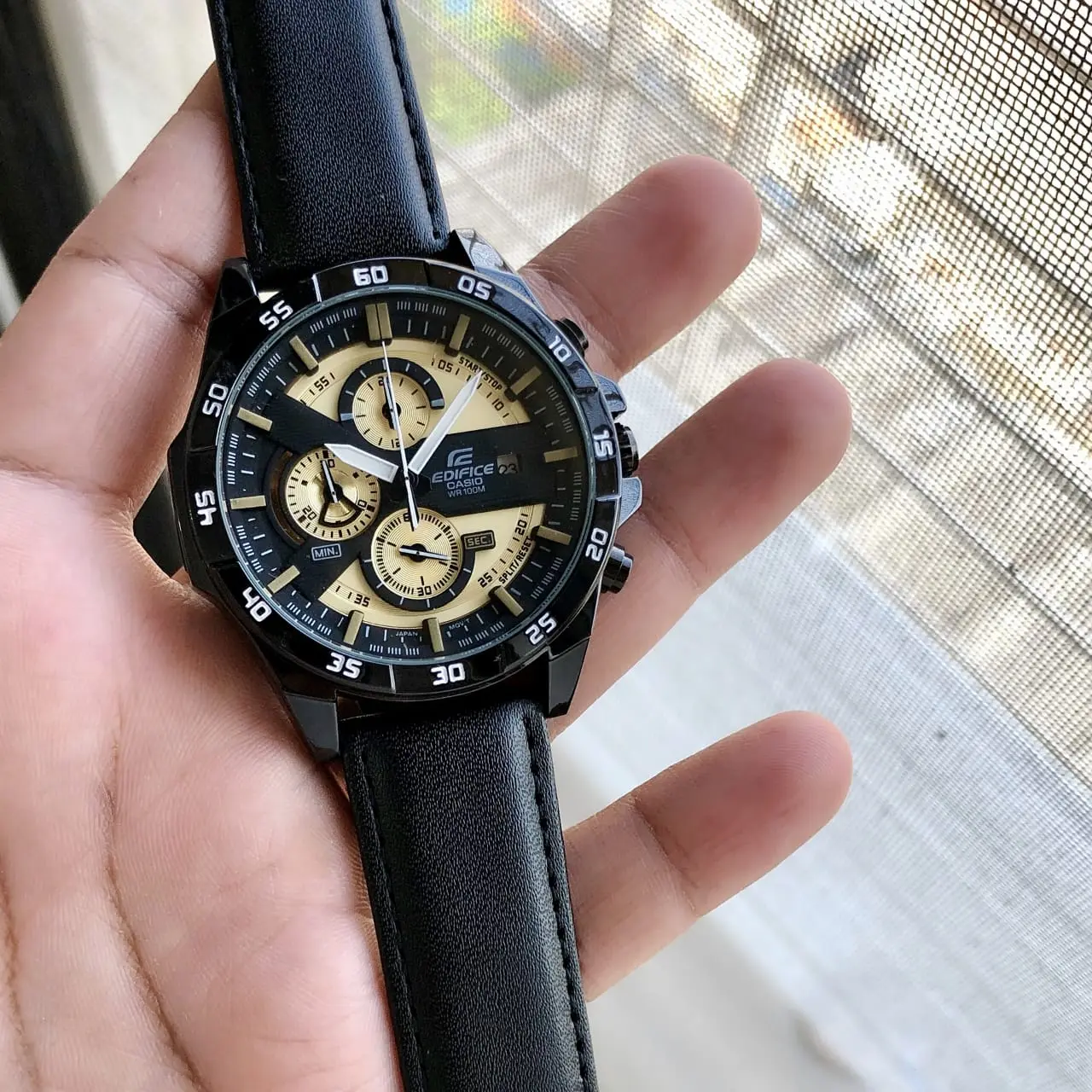 Casio Edifice EFR-556 — gold dial, black case
