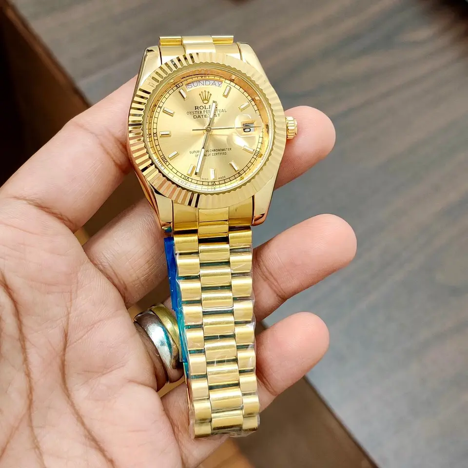 Rolex Day-Date — gold dial, gold