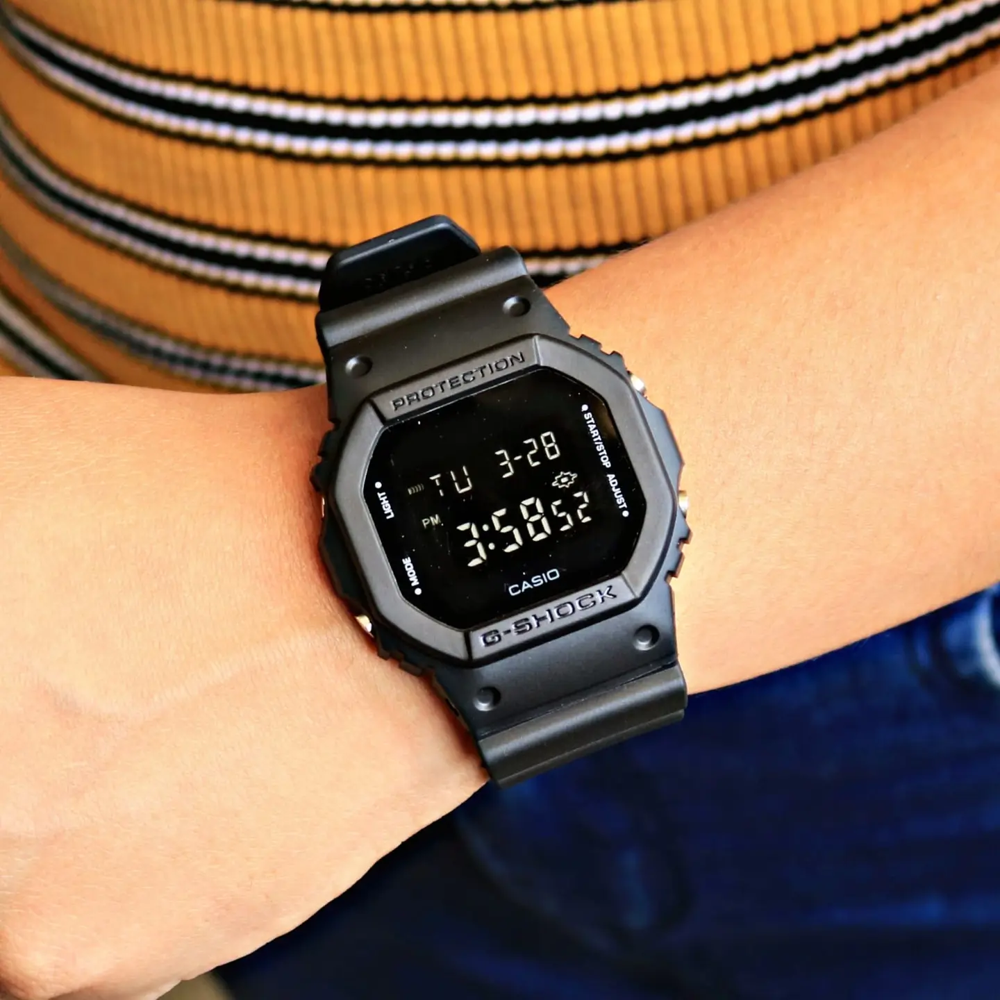 G-Shock DW-5600 — black dial, black case