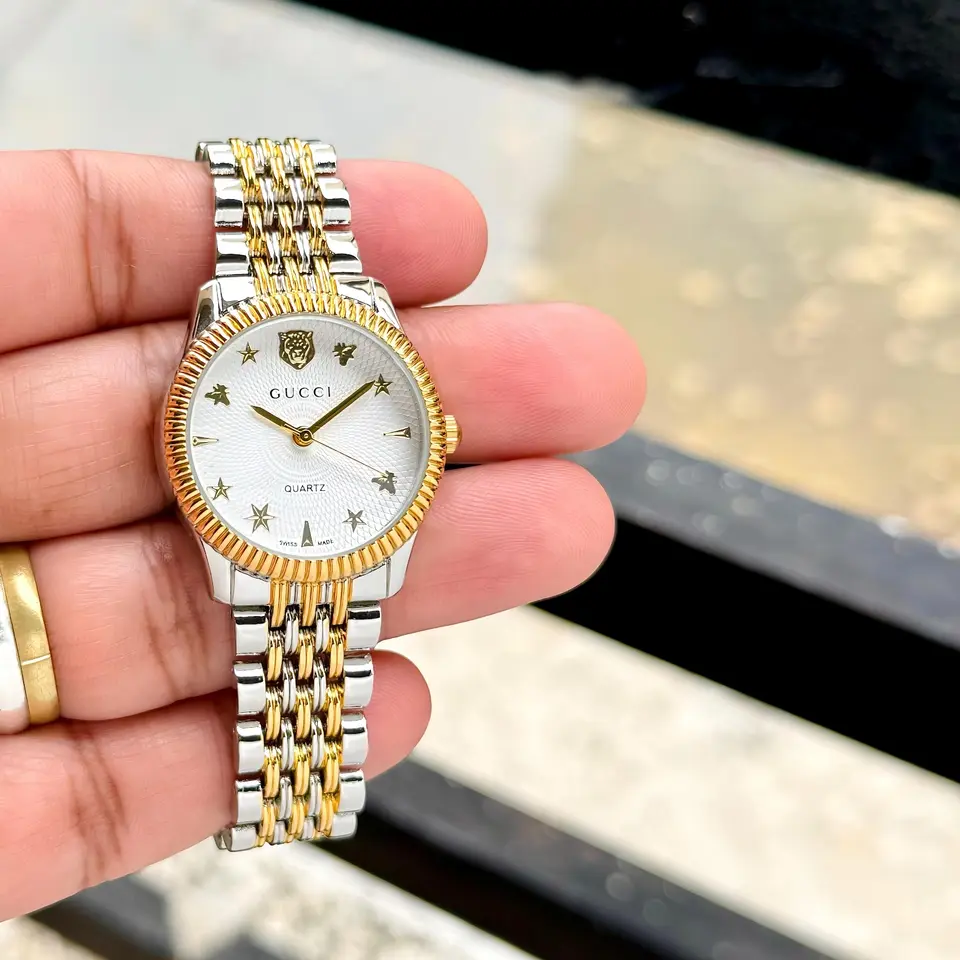 Gucci G-Timeless — white dial, two-tone