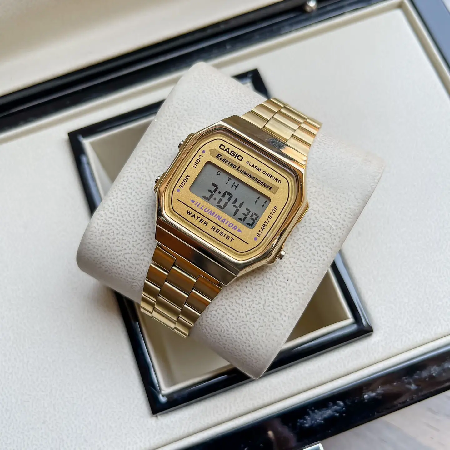 Casio Vintage A168 — gold dial, gold