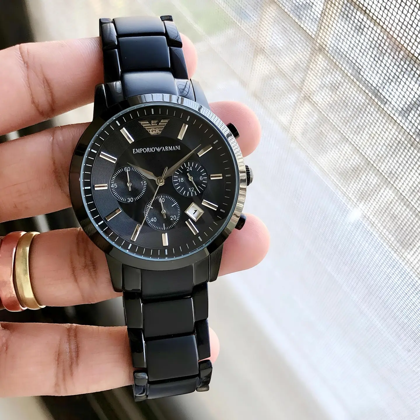 Emporio Armani Chronograph — black dial, black case
