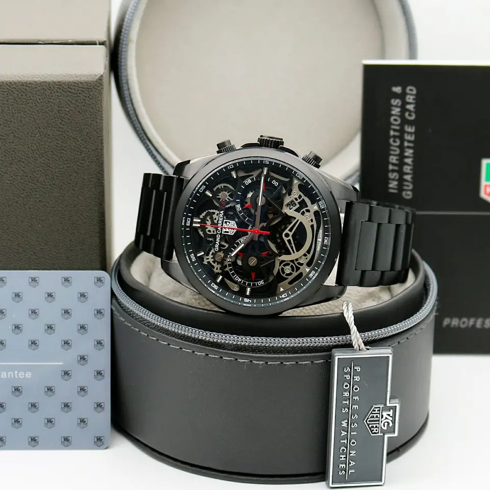 TAG Heuer Grand Carrera — open-worked dial, black case